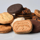 assortment of girl scout cookies on white background